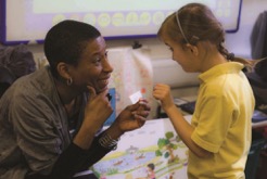 deaf child and adult communicating